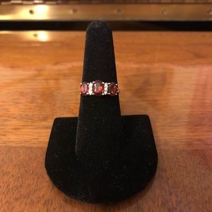 Women’s size 8 gold band with rubies